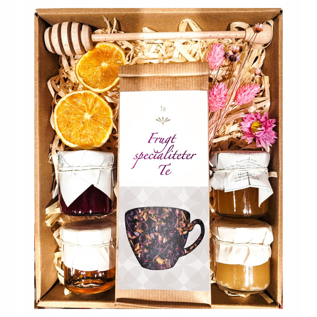 Gavekurv med te, honning, marmelade og tørrede blomster