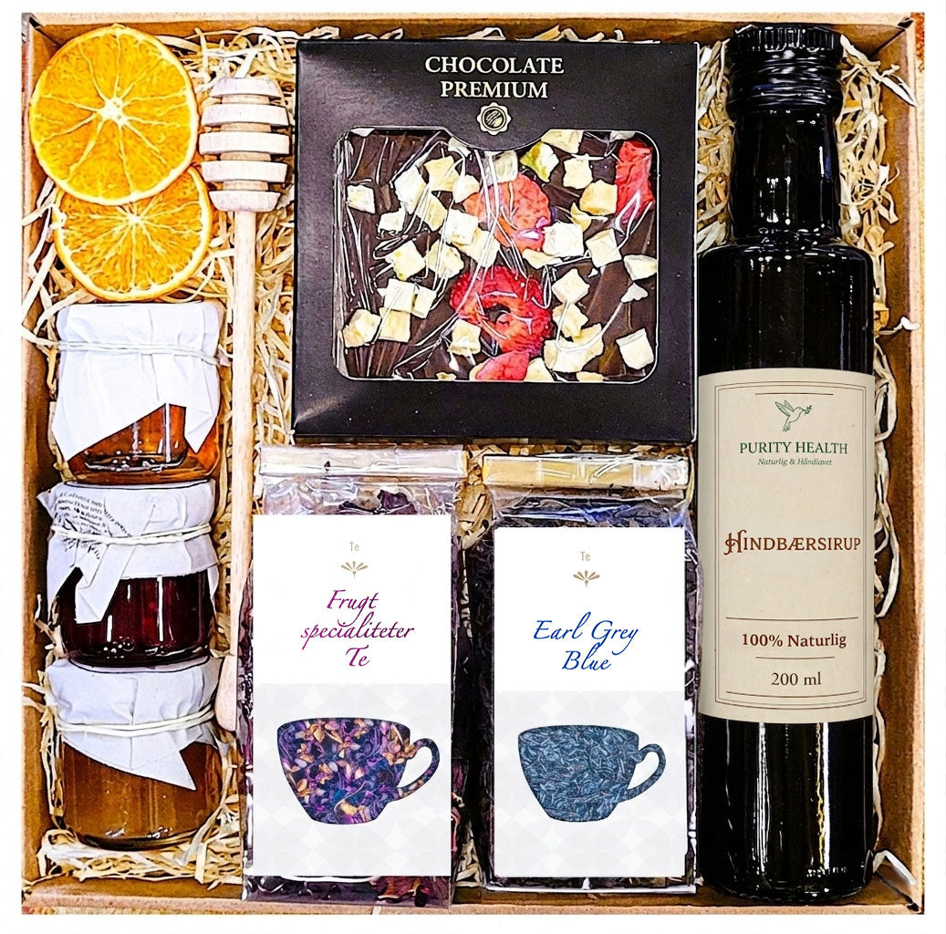 Gavekurv med te, chokolade, sirup og marmelade